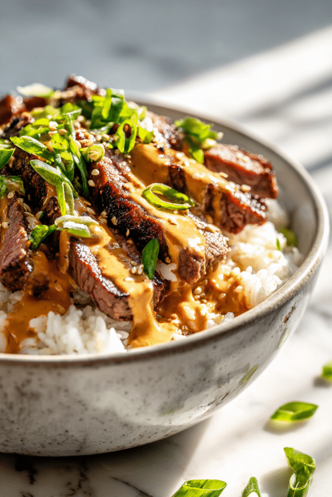 Korean BBQ Steak Rice Bowls with Spicy Cream Sauce