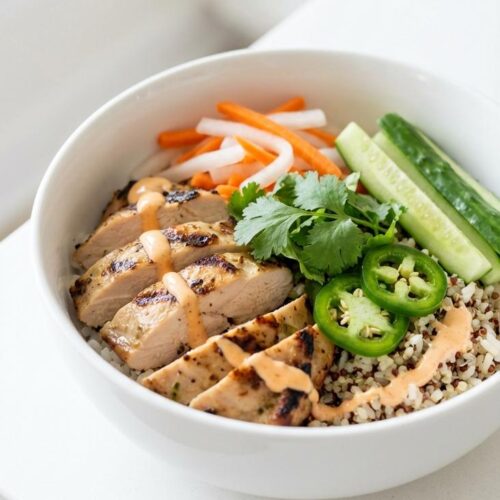 Chicken banh mi meal prep bowls — hero featured shot — finished dish top-down on white plate
